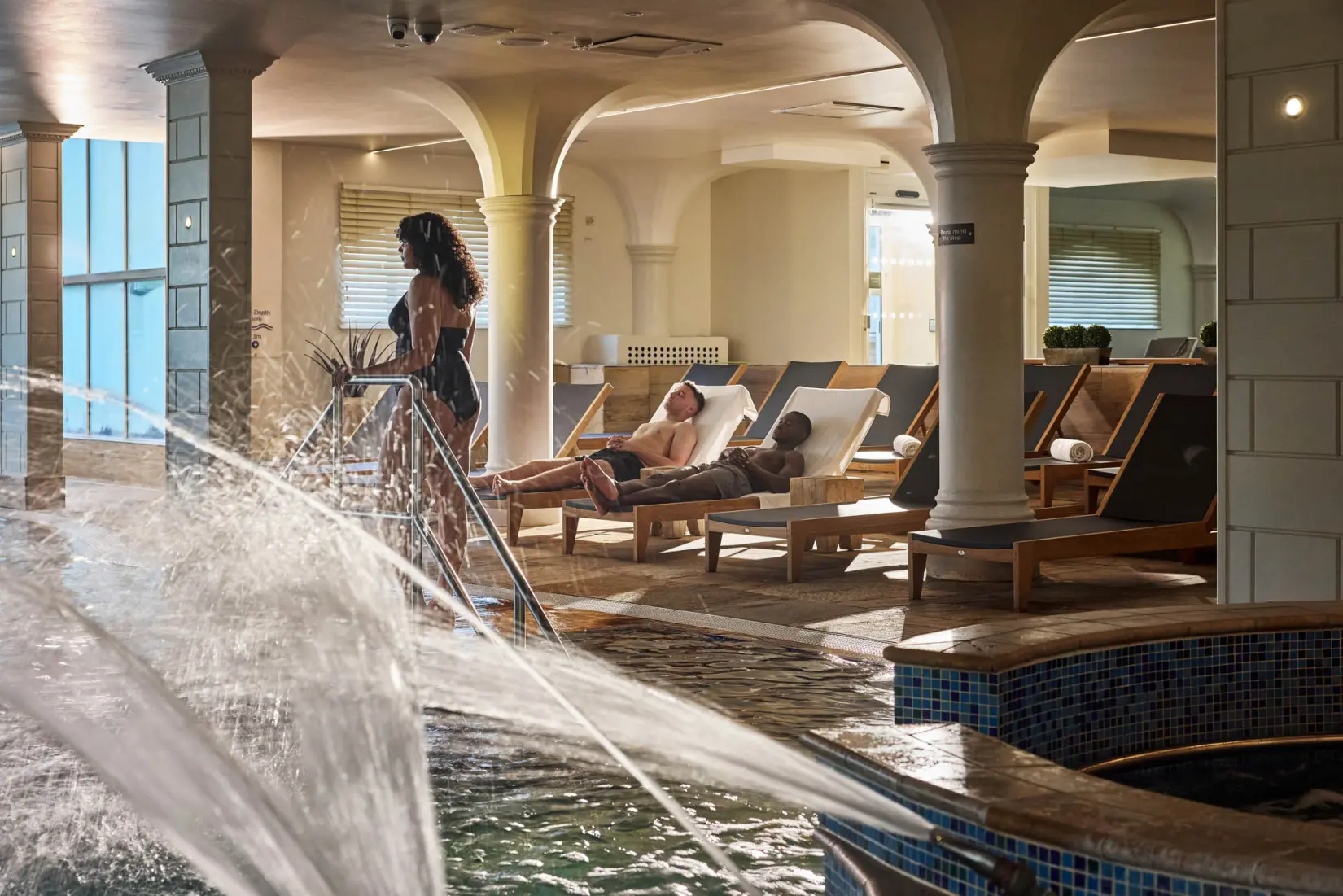 An image of people at the inside pool at Eden Hall