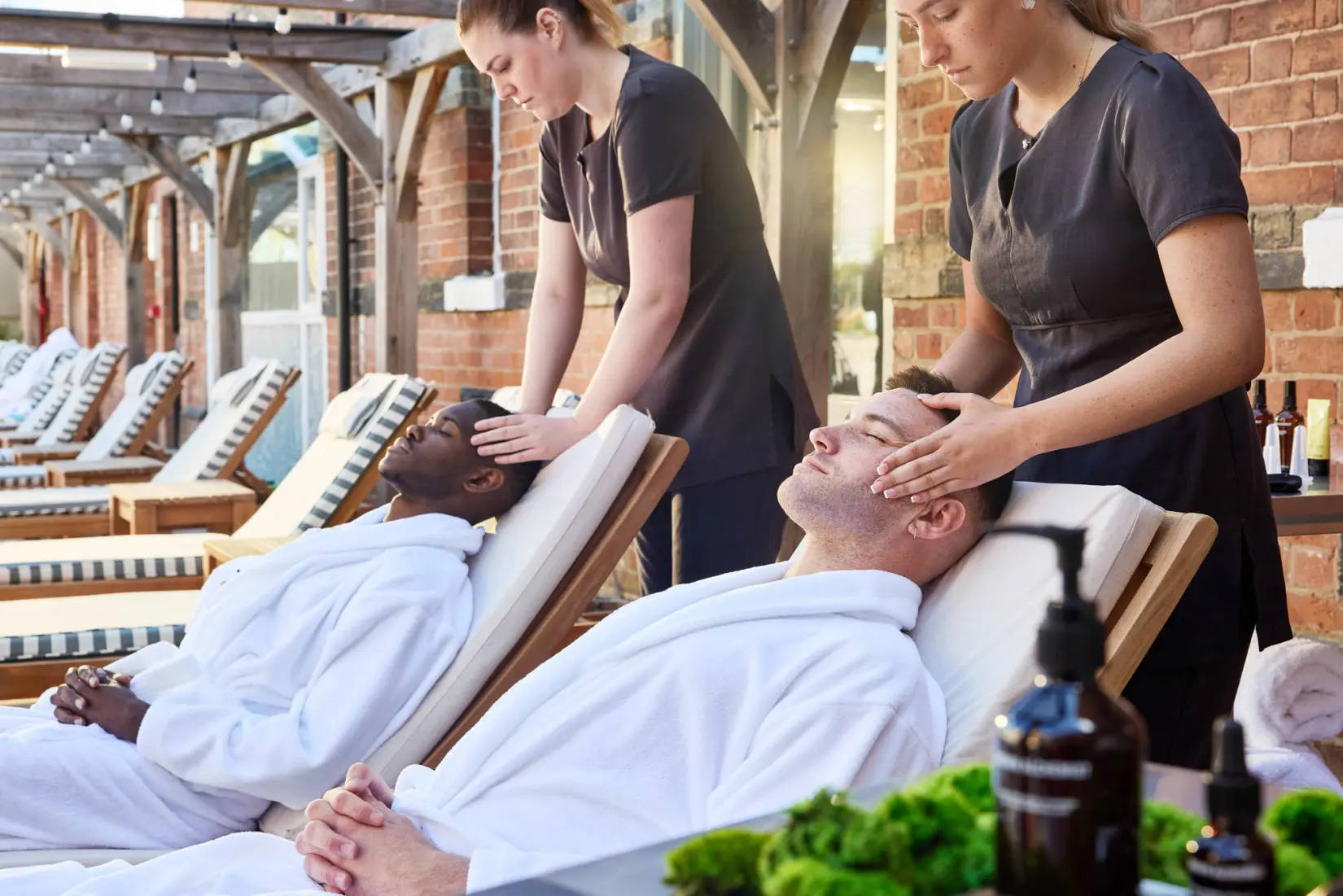 An image of two men getting head massages at Eden Hall