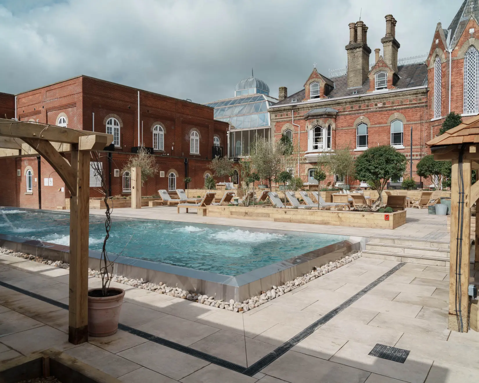 An image of the outside pool and building at Eden Hall