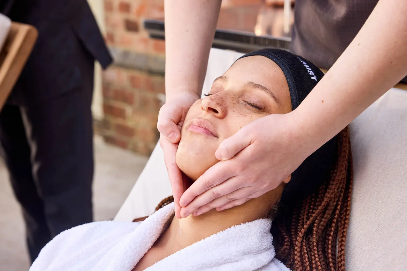 An image of a woman getting a facial at Eden Hall