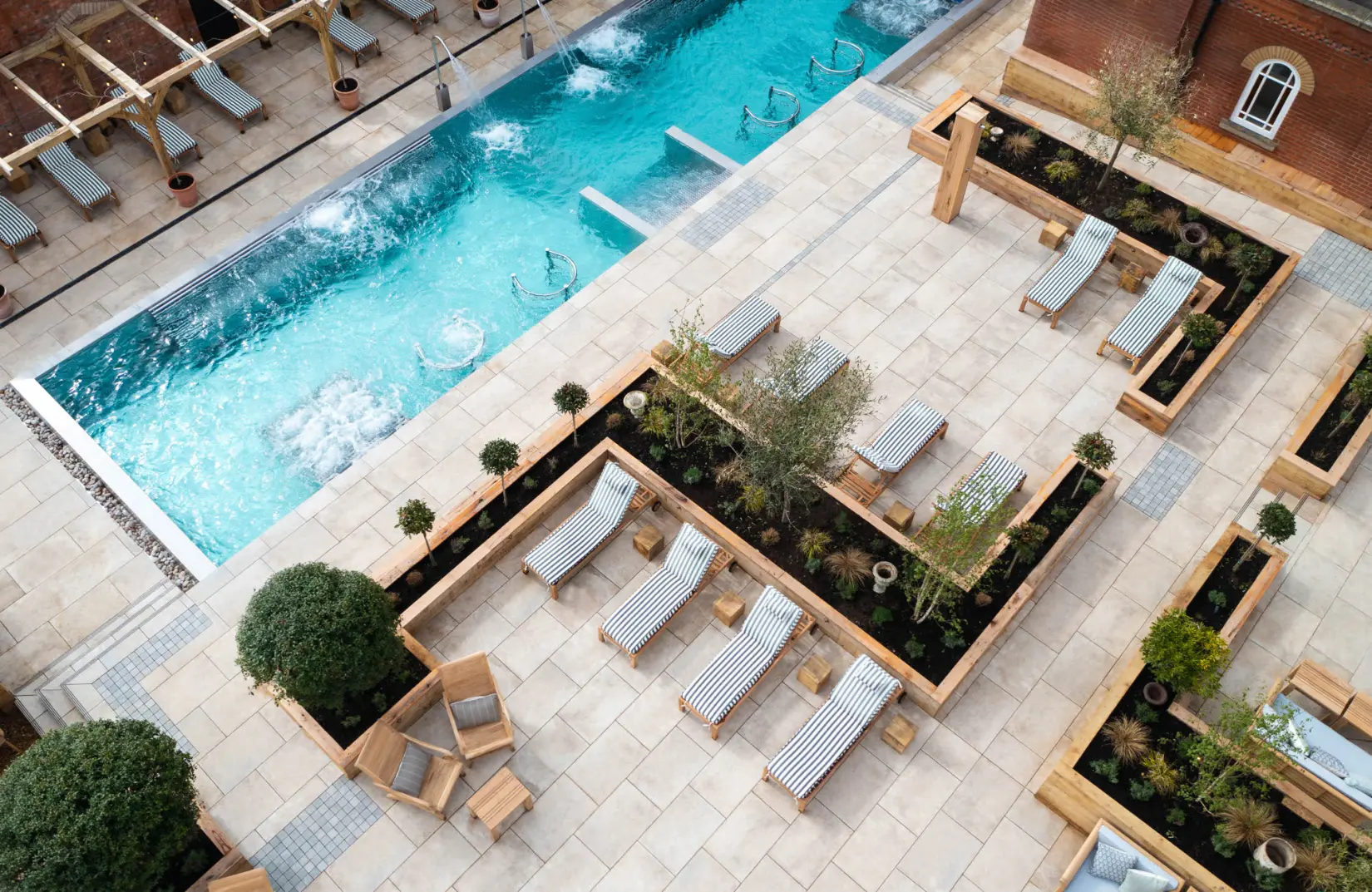 An image of the outdoor pool from above at Eden Hall