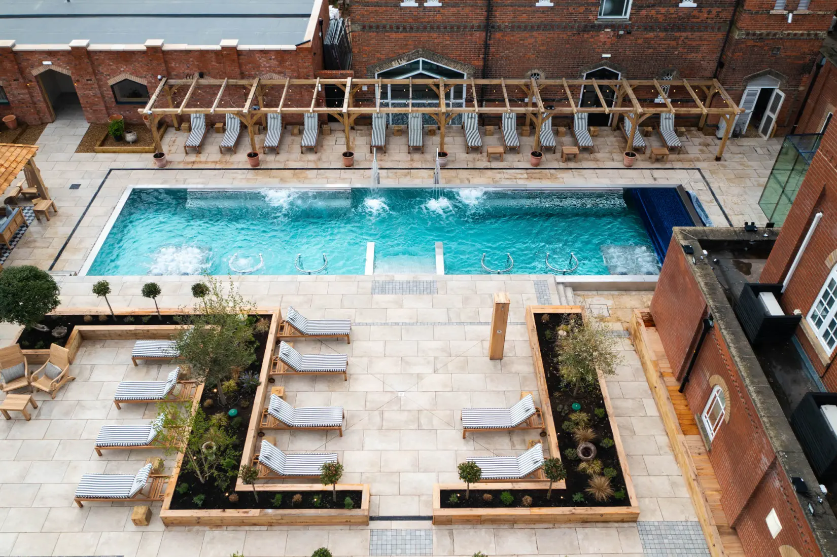 An image of the outdoor pool from above at Eden Hall