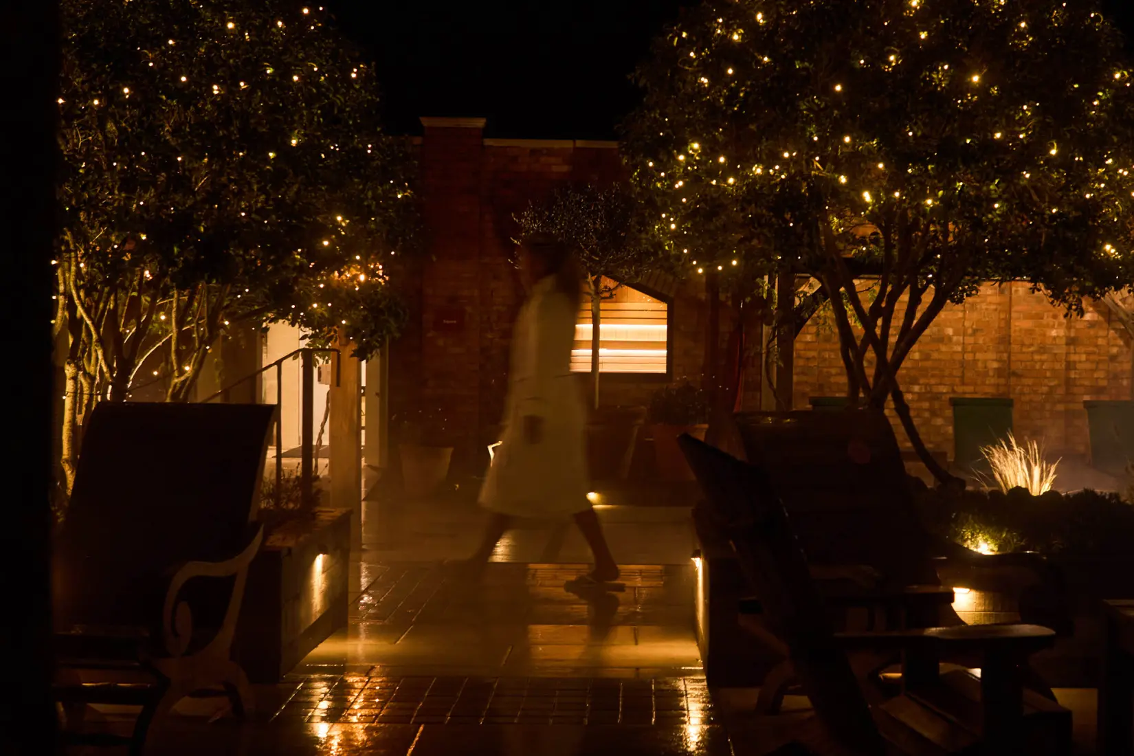 An image of one of the outdoor pools at night at Eden Hall