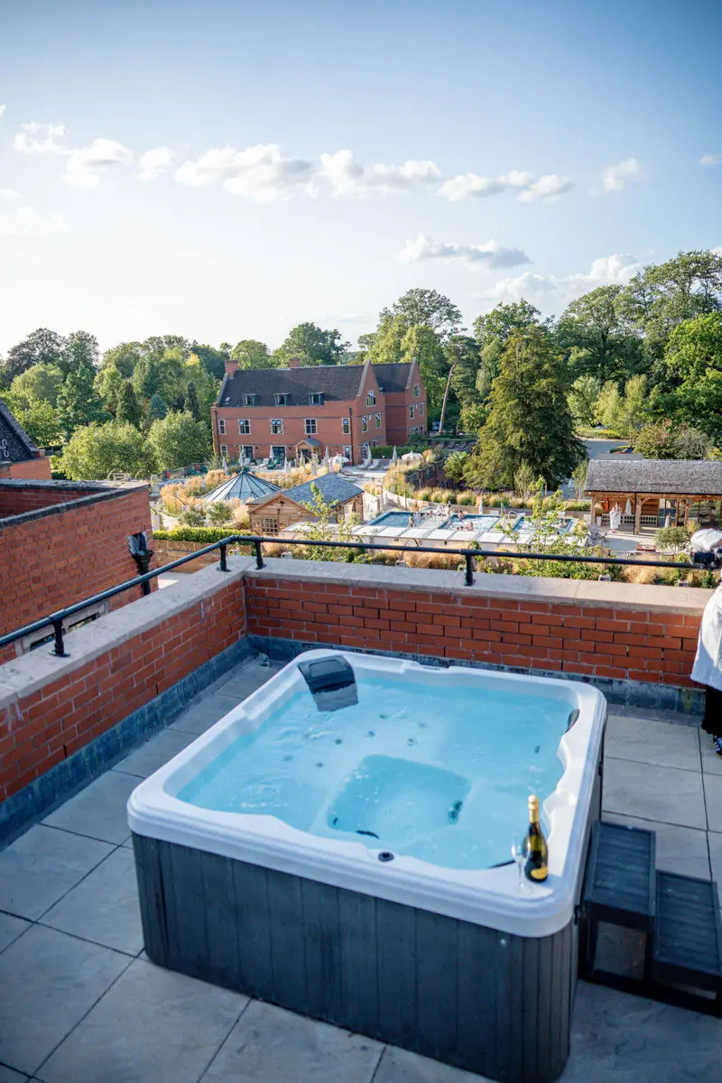 An image of a hot tub on the balcony at Hoar Cross Hall