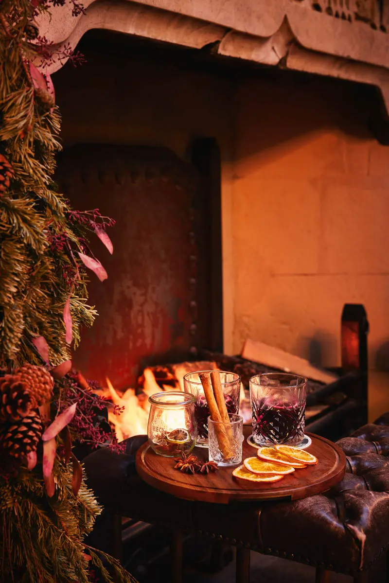 An image of drinks by the fire at Hoar Cross Hall