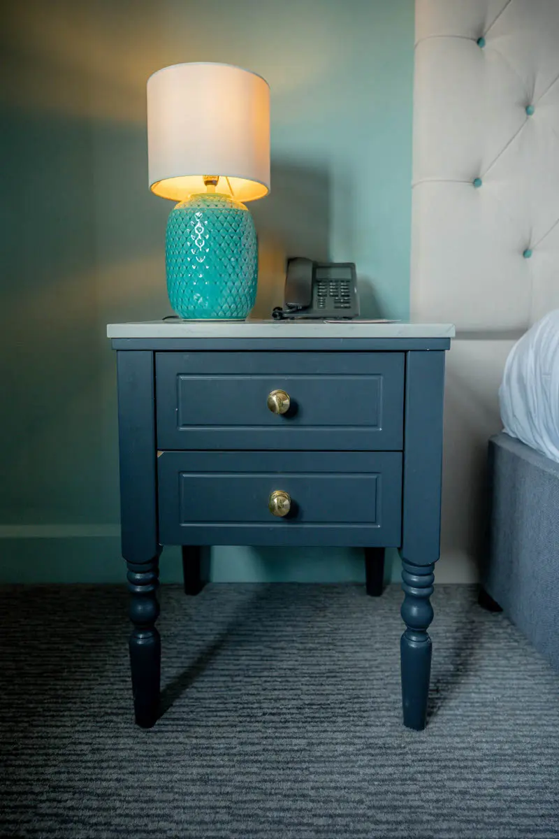 An image of a bedside table at Hoar Cross Hall