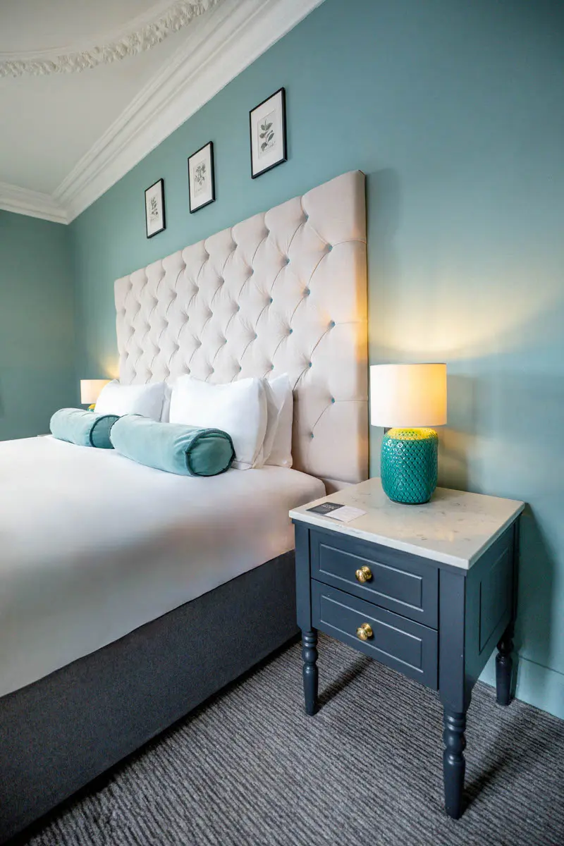 An image of a bed in one of the rooms at Hoar Cross Hall