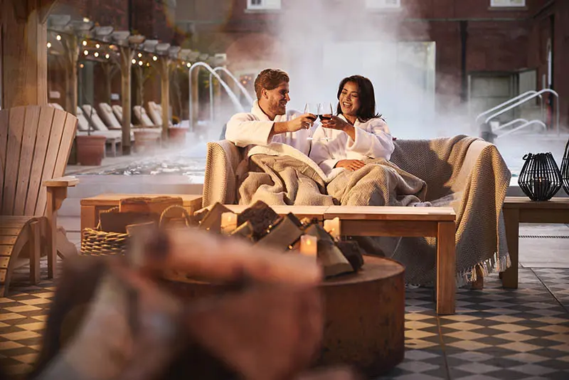 spa garden-firepit-twilight-couple