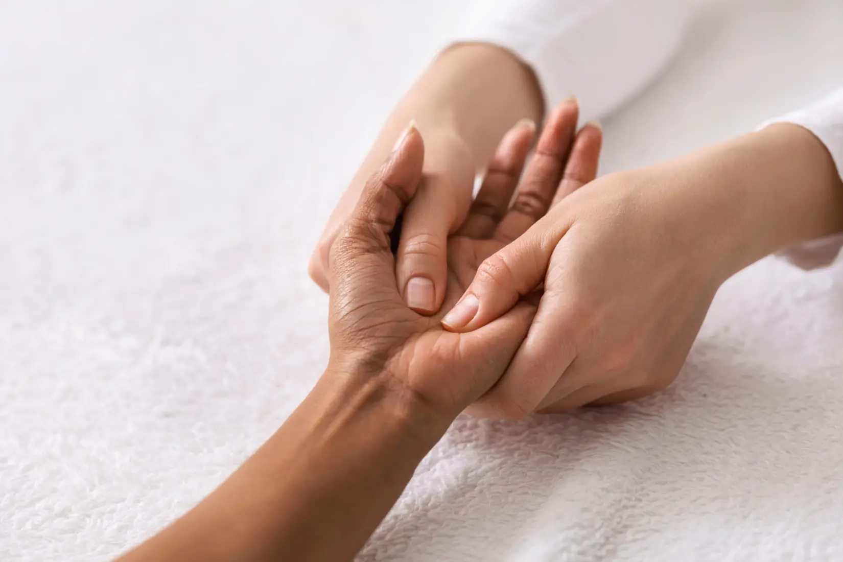 Image of guest experiencing a Deluxe Manicure with Polish