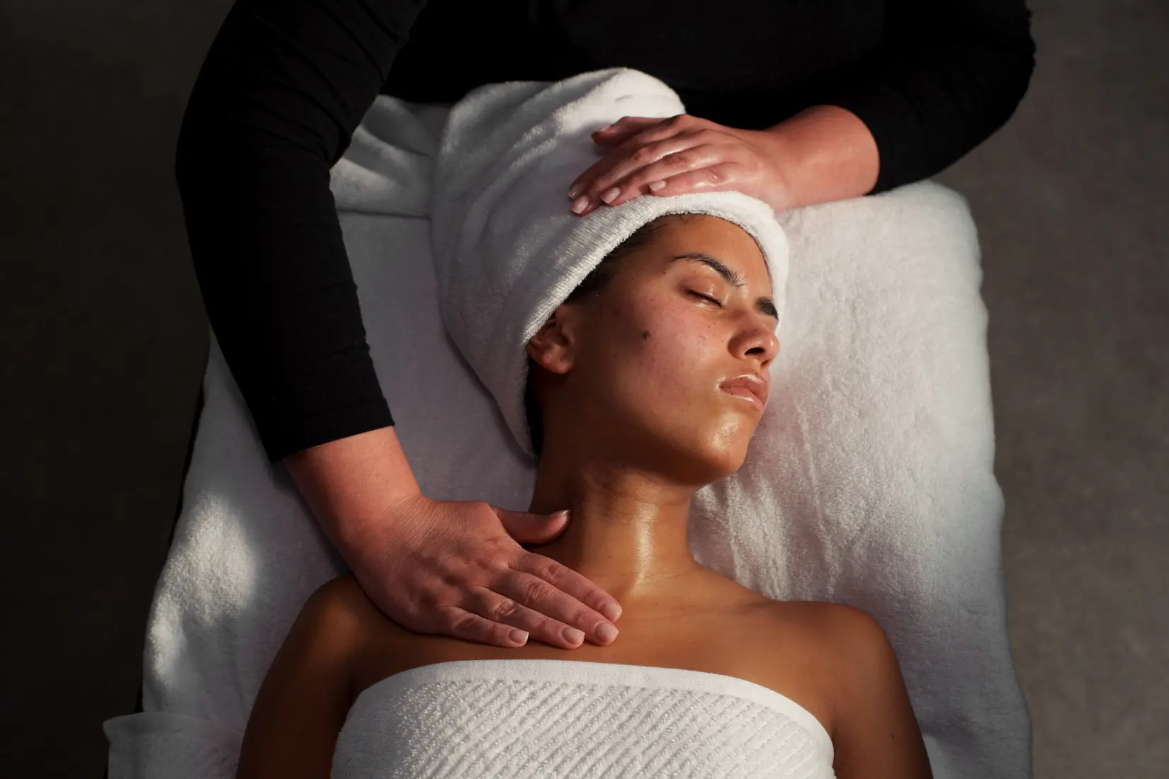 Guest receiving a Grown Alchemist facial