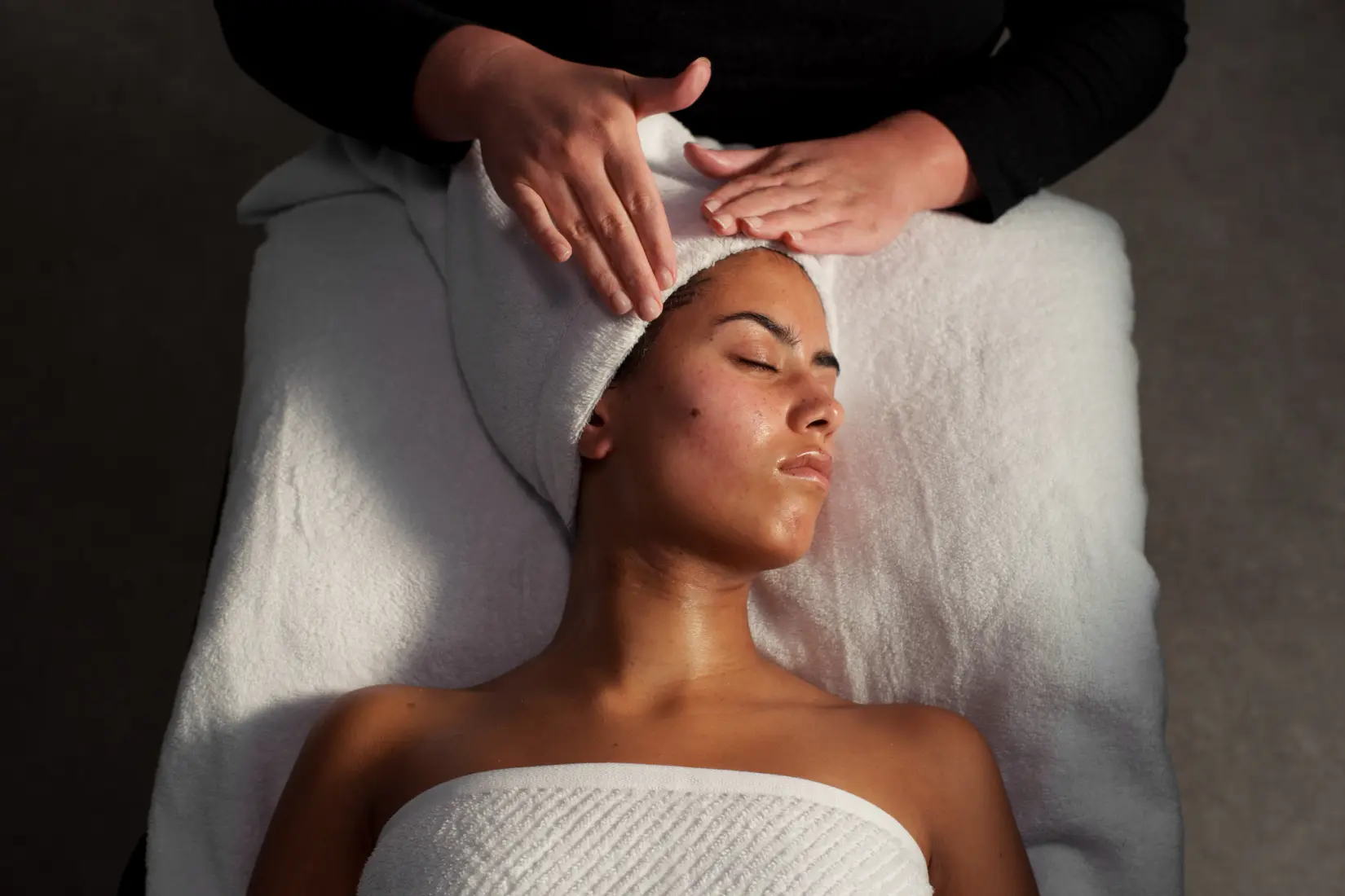 Guest receiving a Grown Alchemist facial