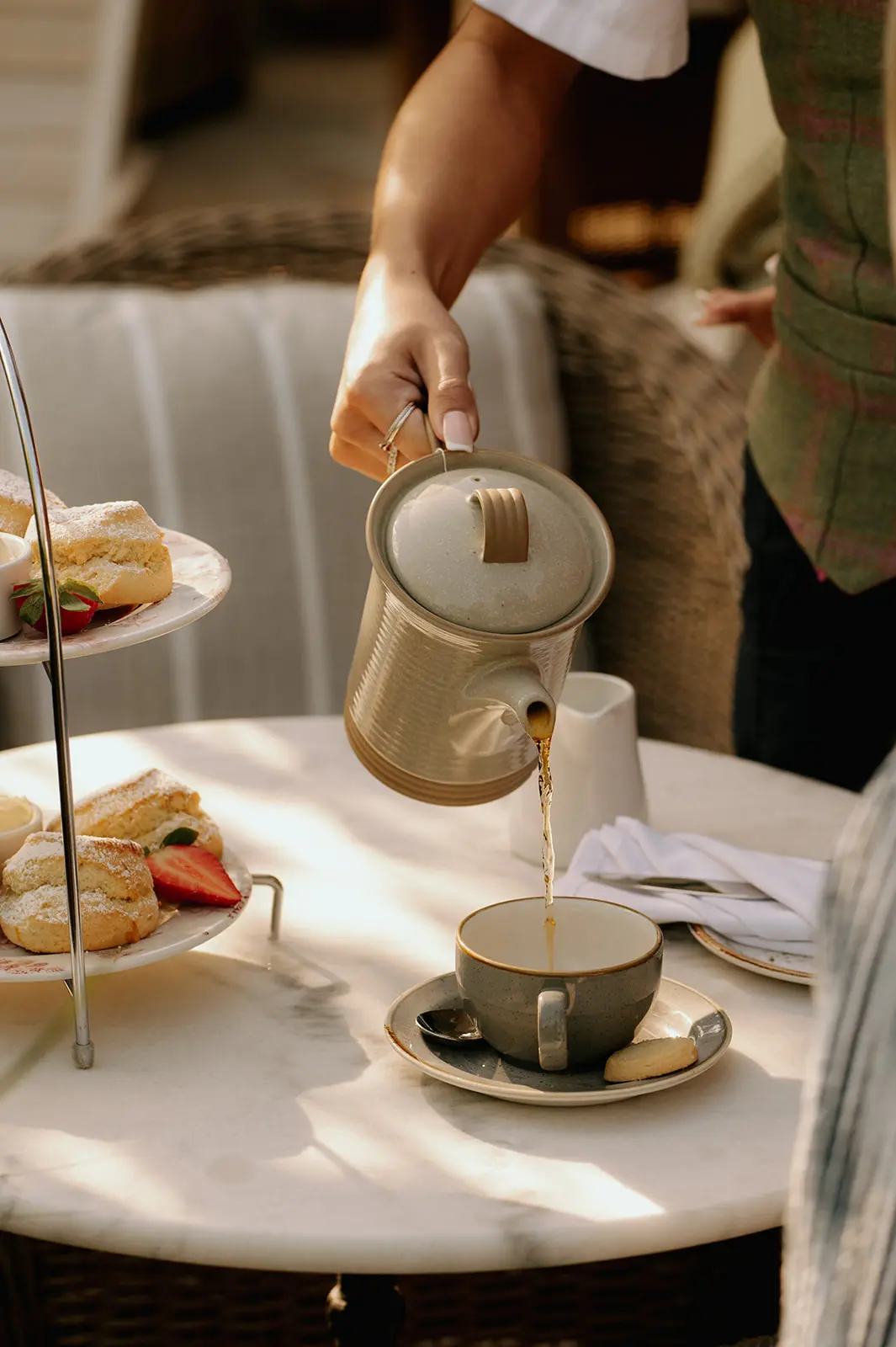 Luxury afternoon tea selection beautifully presented with artisan cakes and savoury bites